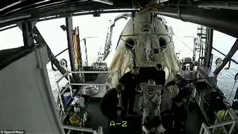 Nasa Astronauts Emerge From Spacex Dragon Capsule After Splashing Down