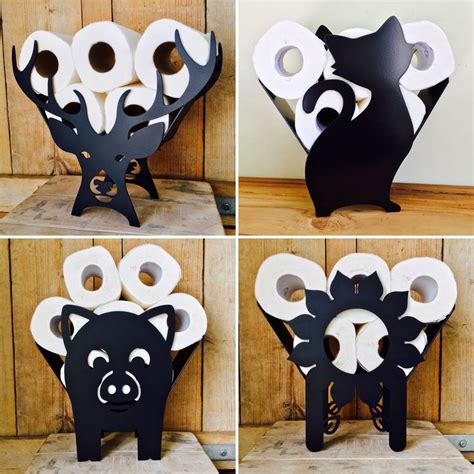 Cat, gross and fish on the first day, tank, cow and lizard on the second, axe, bird and titan on the third. TOILET ROLL HOLDER SHEEP - HORSE - COW NZ MADE! | Felt