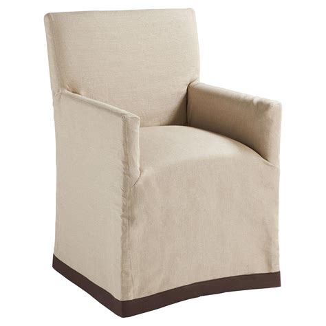 Making a slipcover for a chair is a fairly cheap, easy way to spruce up an old, outdated, or worn chair, and it also gives tuck the corners of the slipcover into the cushions and arms of the chair. Terry Modern Classic Natural Linen Slipcover Dining Arm Chair