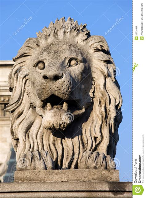 Lion Sculpture On Chain Bridge In Budapest Stock Photo