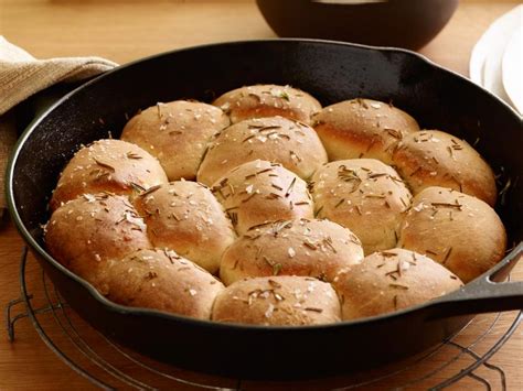 Whip up a hearty batch tonight! Buttered Rosemary Rolls Recipe | Ree Drummond | Food Network