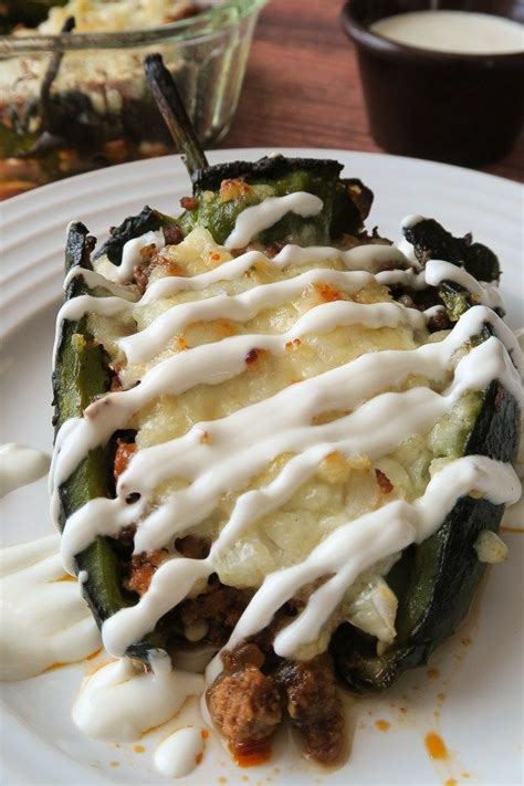 these baked chiles rellenos are made w roasted poblano peppers stuffed with turkey taco meat a