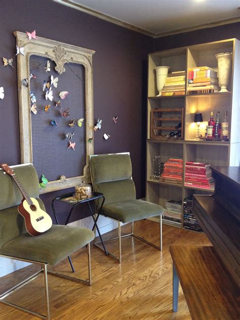 Pbteen.com has been visited by 10k+ users in the past month Deep purple-brown walls, metallic gold crown molding, and ...
