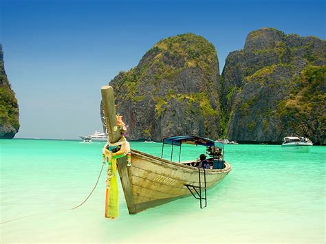 Phi phi island, thailand is perfect if you're looking for pristine blue waters, delicious food, white sand beaches and giant limestone rocks. Phi Phi Islands, Thailand | Natural Creations