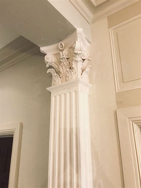 A Bespoke Corinthian Column With Fluted Pilaster And Acanthus Leaf Enriched Capital Creates An