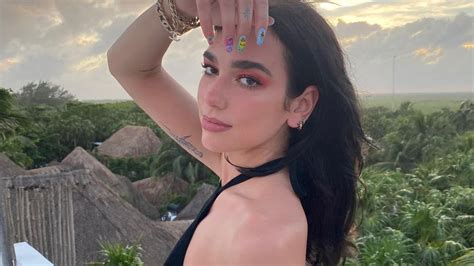 Dua Lipa S Holiday Attire Includes An Exposed Fenty G String As