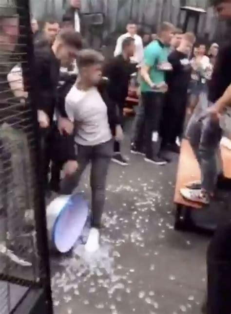 shocking moment mass brawl erupts in nightclub beer garden as glasses go flying otaikapok