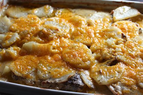 Meanwhile in a nonstick skillet, brown pork chops on both sides. Pork Chops with Creamy Scalloped Potatoes - Cully's Kitchen