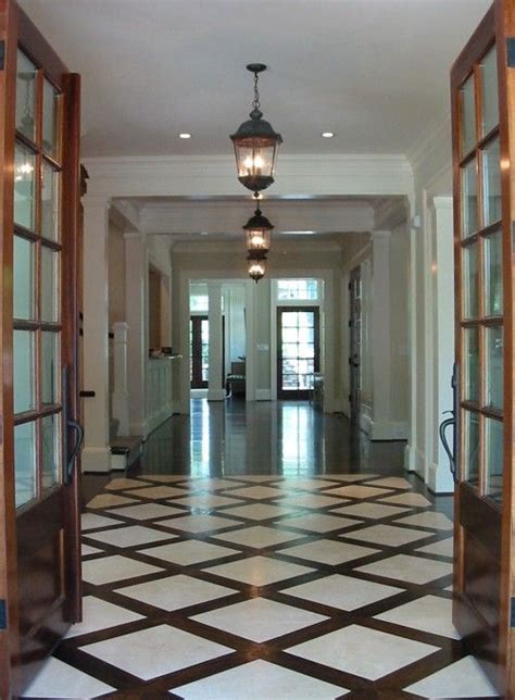 I cannot praise the wonderful team at elegant flooring design! Dresser Homes Chic, elegant foyer entrance design with chocolate brown and ivory ... | Foyer ...