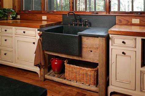 This Rustic Kitchen Has A Stand Alone Farmhouse Apron Sink In Black