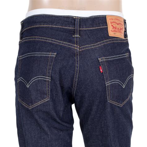 Combining the traditional comfort of the classic texas fit with a fresh, slim silhouette. Mens Dark Blue Levis 511 Slim Fit Jeans with Low Waist