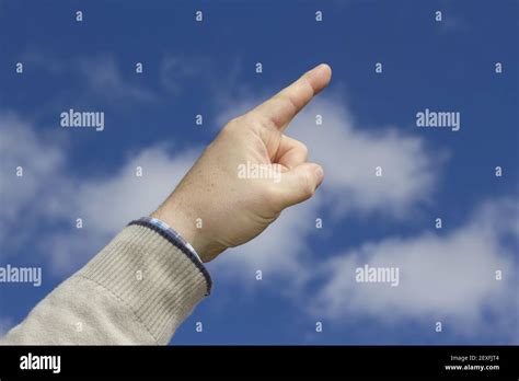 Man With Raised Index Finger Stock Photo Alamy