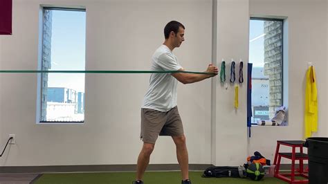 Standing Trunk Rotations With Resistance Band Youtube