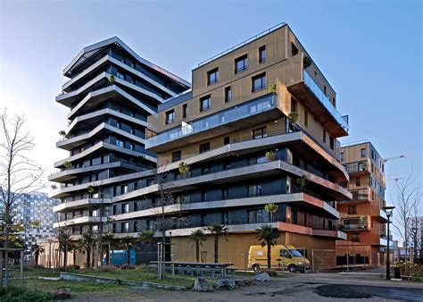 Inoxia Apartments Feature Jagged Wraparound Balconies Architecture