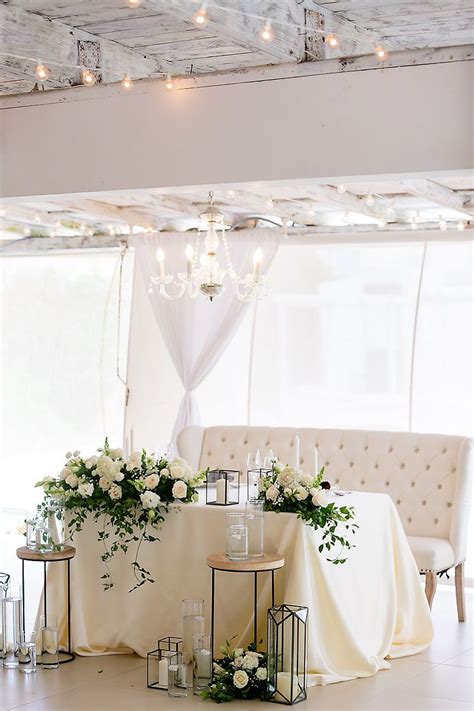 Elegant White Sweetheart Table With Modern Flare Sweetheart Table