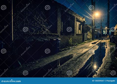 Dark Gritty And Wet Industrial City Alley At Night Stock Image Image