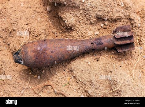 Old Unexploded Mortar Shell Grenade On The Sand Stock Photo Alamy