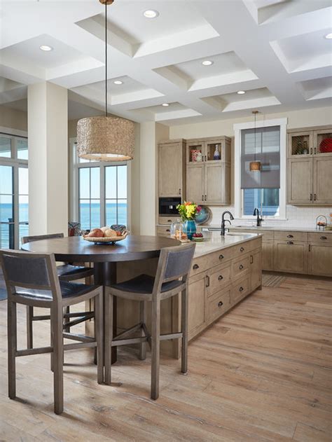 Just look at all the details on this octopus drawer knob. Beach Style Kitchen with Light Wood Cabinets Design Ideas ...