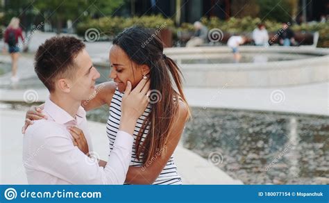 Close Up Of Happy Mixed Race Couple In Love Having Date One Summer Day
