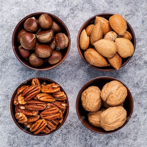 Premium Photo Whole Almonds Walnuts Hazelnut And Pecan Nuts In