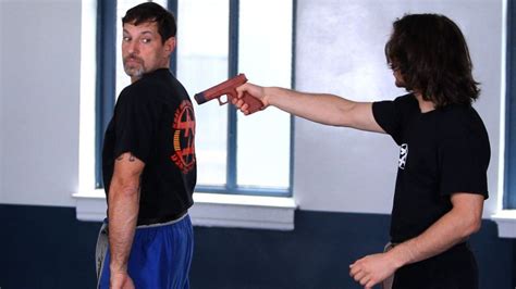 How To Defend Yourself Against A Gun From Rear In Krav Maga Howcast