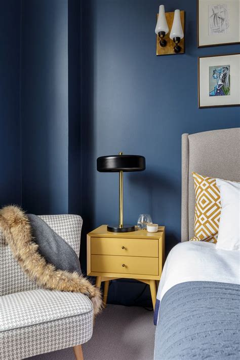 Yellow Details In A Blue Bedroom By Gunter And Co Interiors Yellow