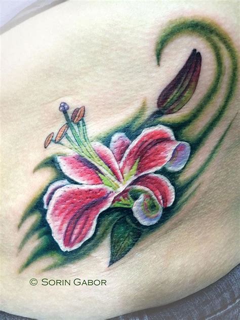 Stargazer Lily Tattoo On Ribs By Sorin Gabor Tattoonow