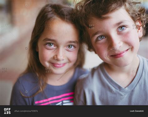 Portrait Of Smiling Fraternal Twins Stock Photo Offset