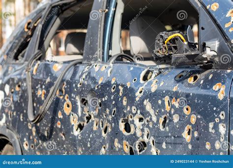 Car Riddled With Bullets War Of Russia Against Ukraine Stock Photo