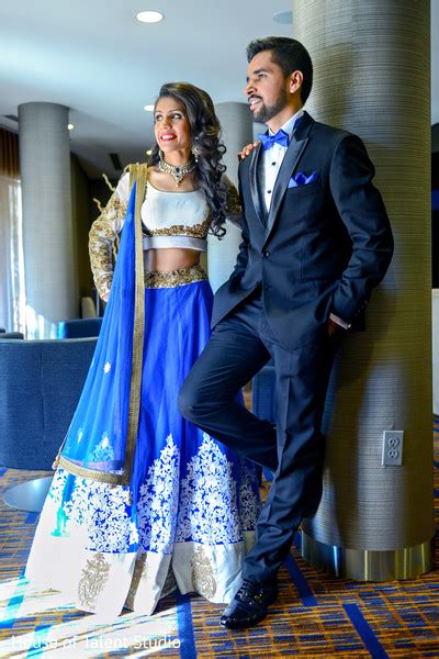 Indian Bride And Groom In Matching Blue Reception Outfits In Edison