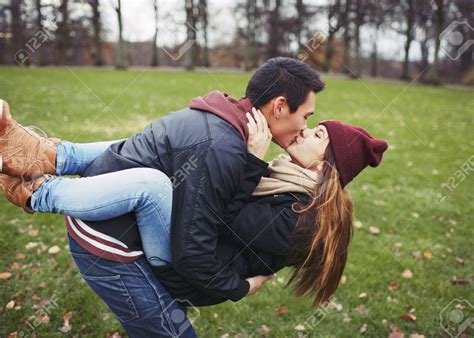 25973406 Attractive Young Man Carrying His Pretty Girlfriend And