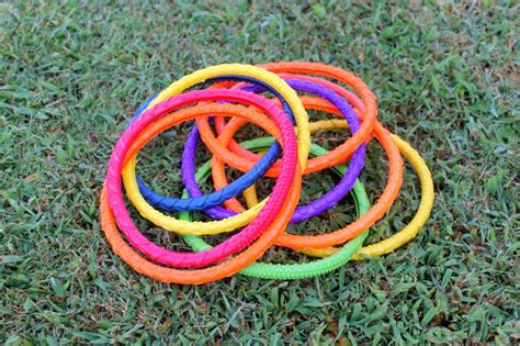 Wrap washi tape around each inner hoop to cover completely. DIY Ring Toss Game - A Little Craft In Your Day