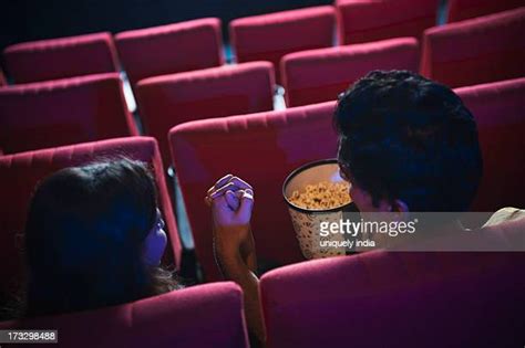 indian couple in theaters photos and premium high res pictures getty images