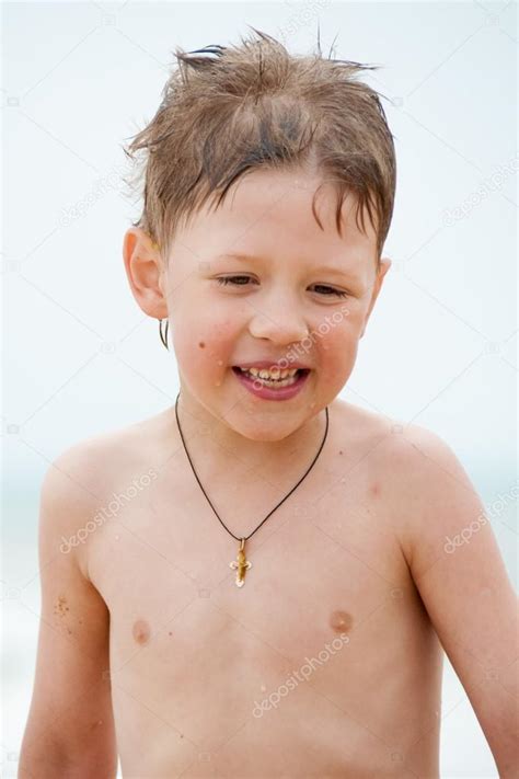 Boy On The Beach With A Naked Torso Stock Photo By Mikhasik