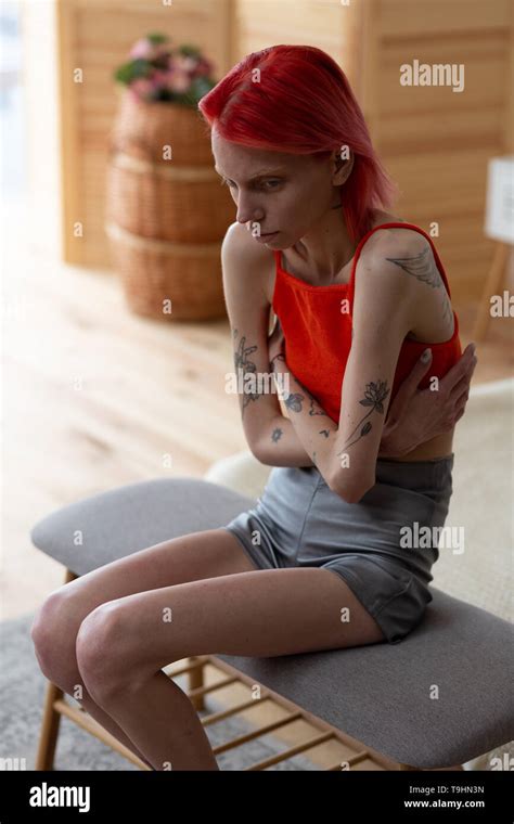 Skinny Woman Wearing Shorts And Top Having Strong Pain Stock Photo Alamy