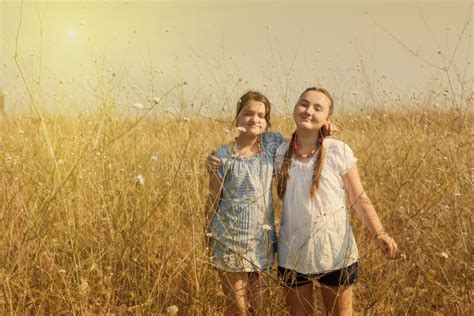Two Kid Girls On The Field Stock Image Image Of Friend 57770421