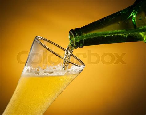 Pouring Beer Into Glass Stock Image Colourbox