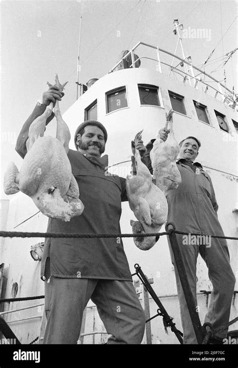 Crew Members Of The Hull Trawler Lord Nelson Show Off Their Christmas Turkeys As They Provision