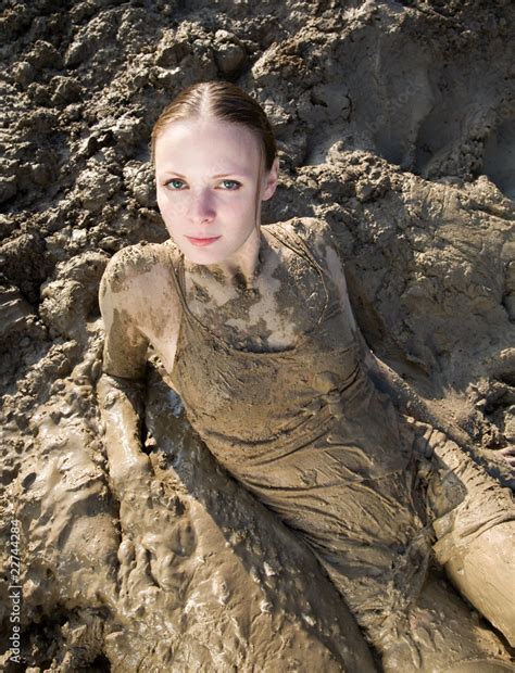 Sexy Woman Lying In The Mud Stock Photo Adobe Stock