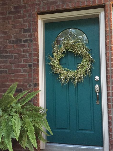 Bricks color exterior materials and supplies outdoor rooms paint. Decorated for summer/spring - Teal painted front door with ...