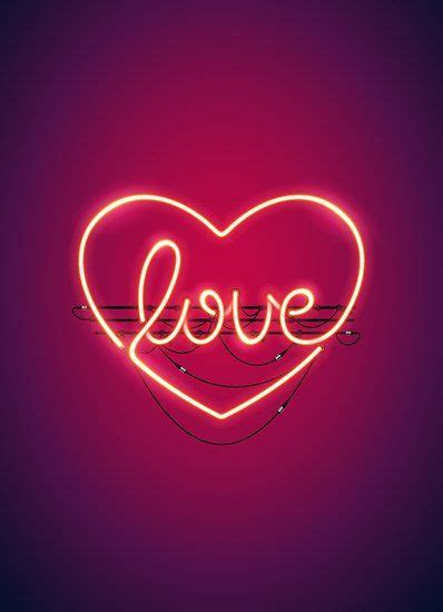 A Neon Heart With The Word Love Written In It On A Purple Background