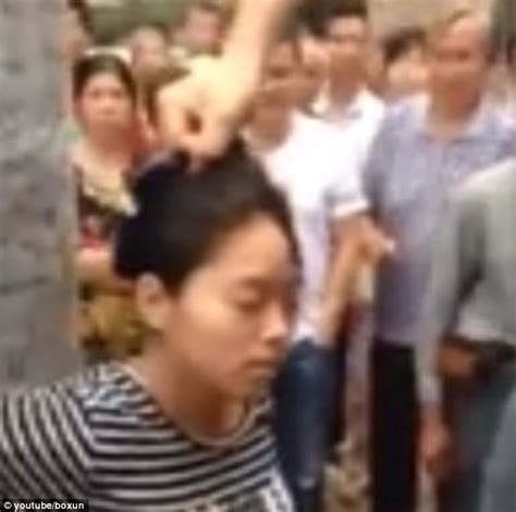 pregnant chinese woman is tied to a pole and beaten for allegedly being a thief daily mail online