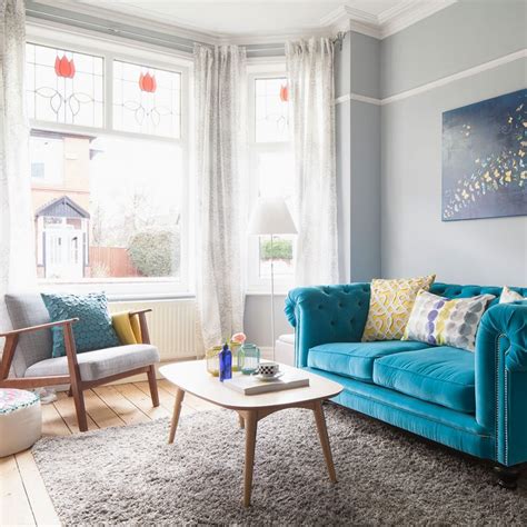 Be Inspired By A Living Room Anchored By A Bold Blue Sofa Ideal Home