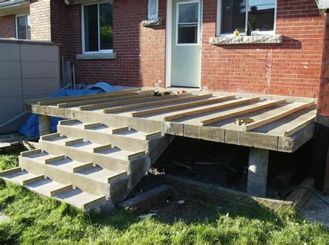 Building A Wooden Deck Over A Concrete One Building A Deck Diy Deck