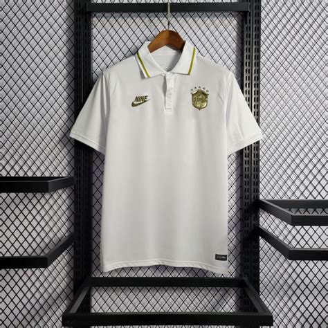 Camisa Polo Brasil Golden 22 23 Torcedor Nike Masculina Branca Doura
