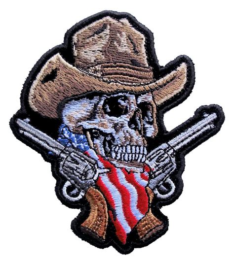 Cowboy skull in a western hat and a pair of crossed gun revolver handgun six shooter pistols drawn in a vintage retro woodcut etched or engraved style. American Cowboy Skull Guns Embroidered Biker Patch ...