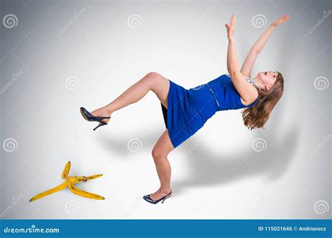 Business Woman Slipping And Falling From A Banana Peel Stock Photo