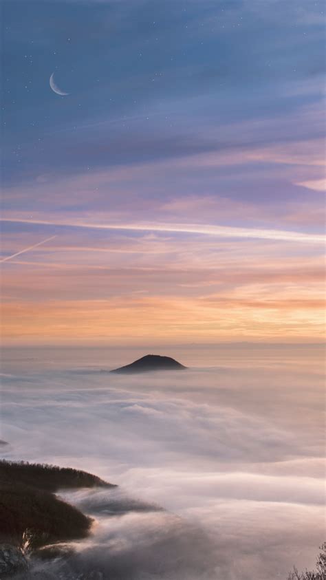 Download Wallpaper 750x1334 Mountain Peak Sunset Sea Of Clouds