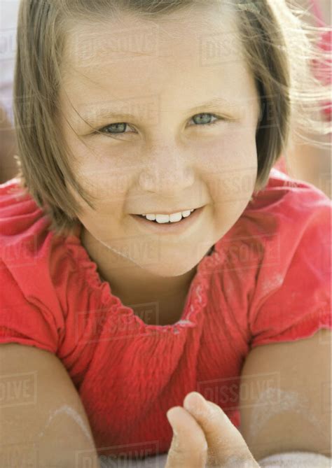 Girl On Beach Close Up Portrait Smiling At Camera Stock Photo Dissolve