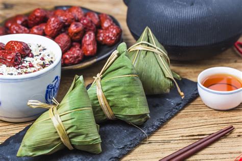 It is considered an unlucky time of year, and many of the at the festival, we also saw tons of street food stalls selling traditional taiwanese street foods. Dragon Boat Festival rice dumplings Photo | Free Download